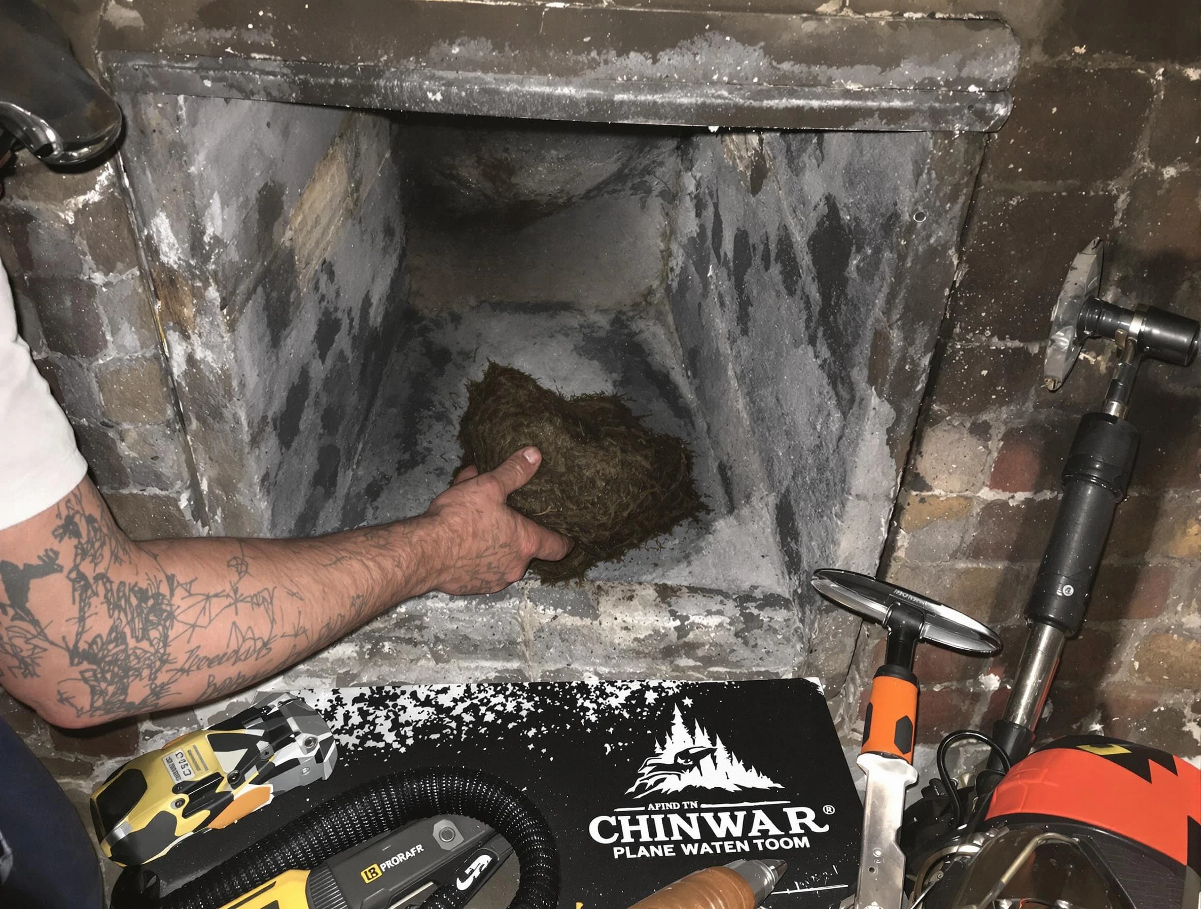 Pemberton Chimney Sweep safely removing debris and screening chimney in Pemberton, NJ